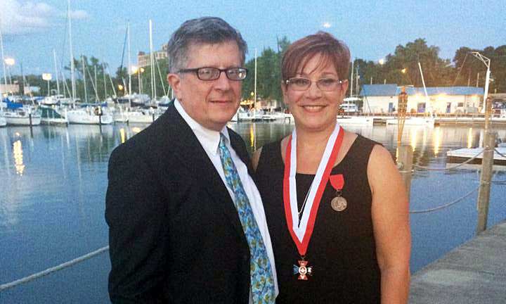 Aundrea Cika Heschmeyer, Director of PolishYoungstown, pictured here with her husband Mark Heschmeyer, in June 2014 when she was awarded the Grand Lady of Pulaski, a knighthood designation, awarded for service to the Polish American community