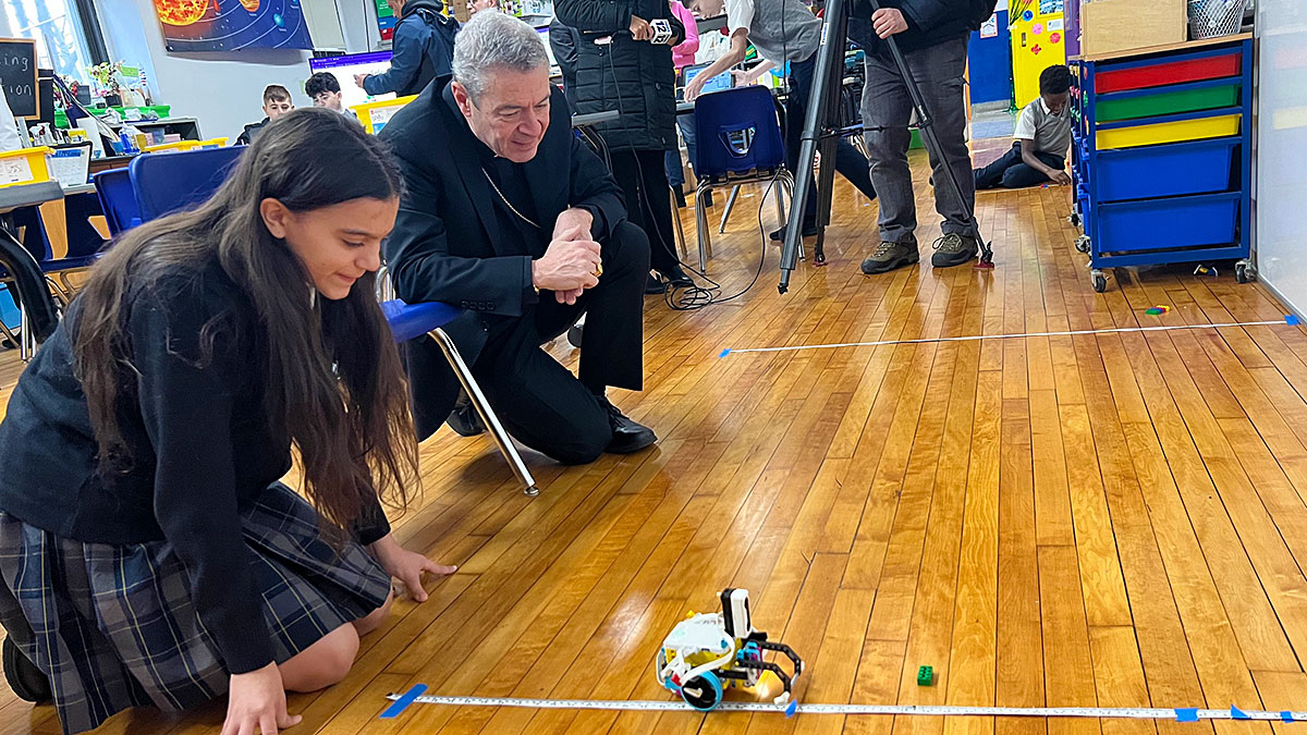 Bishop Brennan has Expressed His Fascination with the Robotics Program at Bay Ridge Catholic Academy